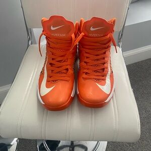 Nike Orange men’s basketball sneakers